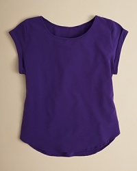 Cuffed sleeves and an on trend rounded hem accent this flowy top. Cuffed sleeves and an on trend rounded hem accent this flowy top.