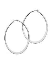 A must-have for every girl's accessory collection. GUESS earrings feature a graduated hoop design in polished, silver tone mixed metal. Approximate diameter: 1-1/2 inches. A must-have for every girl's accessory collection. GUESS earrings feature a graduated hoop design in polished, silver tone mixed metal. Approximate diameter: 1-1/2 inches.