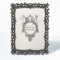 Rich frame with artisan touches. Dozens of hand-set agates and intricate filigree work. Rich frame with artisan touches. Dozens of hand-set agates and intricate filigree work.