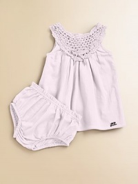 This beautiful knit set with matching bloomers is an instant classic.Round, crochet necklineSleevelessSmocked bodiceButtons at backA-line silhouetteFully linedCottonMachine washImported Please note: Number of buttons may vary depending on size ordered. This beautiful knit set with matching bloomers is an instant classic.Round, crochet necklineSleevelessSmocked bodiceButtons at backA-line silhouetteFully linedCottonMachine washImported Please note: Number of buttons may vary depending on size ordered.