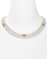 Strands of shimmering glass pearls take on a new state of grace on this two row Lauren Ralph Lauren necklace, accented by elegant crystal stations. Strands of shimmering glass pearls take on a new state of grace on this two row Lauren Ralph Lauren necklace, accented by elegant crystal stations.