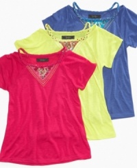 Boost her basics. A simple braid along the neckline of these tees from Jessica Simpson will add the perfect accent to her look. Boost her basics. A simple braid along the neckline of these tees from Jessica Simpson will add the perfect accent to her look.