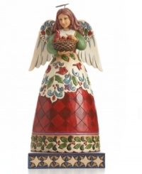 Hark! This gentle angel sets a joyful tone in holiday homes. Baby cardinals chirping in her basket and carved in her skirt celebrate the beauty of nature. With brilliant holly detail, red check and swirling winter wind. From Jim Shore. Hark! This gentle angel sets a joyful tone in holiday homes. Baby cardinals chirping in her basket and carved in her skirt celebrate the beauty of nature. With brilliant holly detail, red check and swirling winter wind. From Jim Shore.