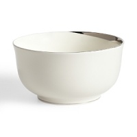 This small round bowl glows with a hand-painted bright platinum design to create a contemporary classic on your table that will complement your dining experience throughout a lifetime of shifting trends and evolving fashions. This small round bowl glows with a hand-painted bright platinum design to create a contemporary classic on your table that will complement your dining experience throughout a lifetime of shifting trends and evolving fashions.