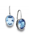 Cool blues. Add a pastel pop to your look with stunning oval-cut blue topaz (20 ct. t.w.) drop earrings. Set in sterling silver. Approximate drop: 1-1/10 inches.