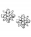 Springtime sparkle. These luminous stud earrings feature round and baguette-cut diamonds (1/4 ct. t.w.) in the shape of flowers. Set in 14k white gold. Approximate diameter: 2/5 inch.