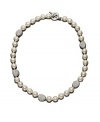 A couture collar necklace, by Lauren Ralph Lauren. Elegant glass pearl (10 mm) is accented by crystal-encrusted nuggets of silvertone mixed metal. Approximate length: 18 inches.