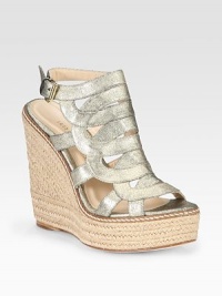 Artfully crafted metallic leather adds a touch of sheen to this timeless espadrille design. Cork wedge, 5 (125mm)Covered platform, 1½ (40mm)Compares to a 3½ heel (90mm)Metallic leather upperAdjustable ankle strapLeather liningBuffed leather solePadded insoleImportedOUR FIT MODEL RECOMMENDS ordering true size. Artfully crafted metallic leather adds a touch of sheen to this timeless espadrille design. Cork wedge, 5 (125mm)Covered platform, 1½ (40mm)Compares to a 3½ heel (90mm)Metallic leather upperAdjustable ankle strapLeather liningBuffed leather solePadded insoleImportedOUR FIT MODEL RECOMMENDS ordering true size.