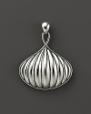 Beautifully sculpted sterling silver makes a bold statement in this pendant.