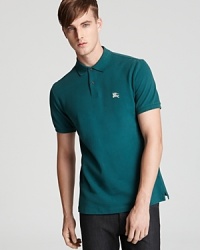 The check placket of this refined and thoroughly modern design separates this pique polo from all the others. The check placket of this refined and thoroughly modern design separates this pique polo from all the others.