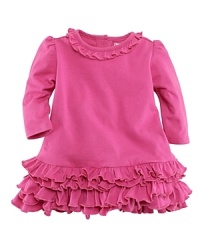 An adorable dress is accented with tiers of ruffles for a girly look. An adorable dress is accented with tiers of ruffles for a girly look.