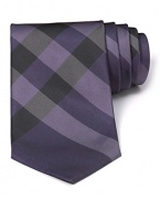 A signature check print tie from Burberry London, rendered in luxurious Italian silk for a stunning look and touch.