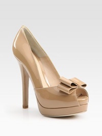 Patent leather peep toe wrapped to perfection by a darling bow. Self-covered heel, 5 (125mm)Island platform, 1¼ (30mm)Compares to a 3¾ heel (95mm)Patent leather upperLeather liningBuffed leather soleMade in ItalyOUR FIT MODEL RECOMMENDS ordering one half size up as this style runs small. Patent leather peep toe wrapped to perfection by a darling bow. Self-covered heel, 5 (125mm)Island platform, 1¼ (30mm)Compares to a 3¾ heel (95mm)Patent leather upperLeather liningBuffed leather soleMade in ItalyOUR FIT MODEL RECOMMENDS ordering one half size up as this style runs small.