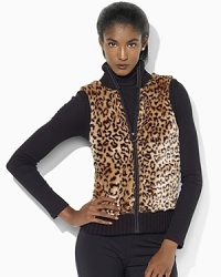 A soft combed cotton vest is finished with plush faux fur at the front for modern style. A soft combed cotton vest is finished with plush faux fur at the front for modern style.