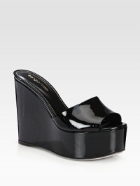 A curved wedge heightens this sleek patent leather slide. Self-covered wedge, 5 (125mm)Covered platform, 2 (50mm)Compares to a 3 heel (75mm)Patent leather upperLeather lining and solePadded insoleMade in Italy A curved wedge heightens this sleek patent leather slide. Self-covered wedge, 5 (125mm)Covered platform, 2 (50mm)Compares to a 3 heel (75mm)Patent leather upperLeather lining and solePadded insoleMade in Italy