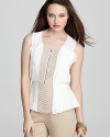 Precise pleating creates a captivating silhouette on this VINCE CAMUTO blouse, rendered in airy chiffon.