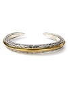 Feather jewelry is trending. So make the bohemian-inspired look yours with this sterling silver and yellow gold cuff from Elizabeth and James.