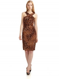 THE LOOKCrisscross necklineAllover crocodile printSleevelessCurved side seam with gathered detailsSquare backBack zipperTHE FITAbout 41½ from shoulder to hemTHE MATERIAL92% polyester/5% spandex/3% other fibersFully linedCARE & ORIGINDry cleanMade in USA of imported fabricModel shown is 5'10 (177cm) wearing US size 4. THE LOOKCrisscross necklineAllover crocodile printSleevelessCurved side seam with gathered detailsSquare backBack zipperTHE FITAbout 41½ from shoulder to hemTHE MATERIAL92% polyester/5% spandex/3% other fibersFully linedCARE & ORIGINDry cleanMade in USA of imported fabricModel shown is 5'10 (177cm) wearing US size 4.