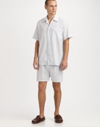 Relax and lounge-around in this remarkably comfortable two-piece short set, in easy-fitting, lightweight cotton. Machine wash. Imported.SHIRTSpread collarButtonfrontChest patch pocketSHORTSAdjustable two-button waistButton flyNo pocketsInseam, about 3½