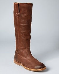 Charming cross stitch details add a special, subtle touch to these pull on boots from Frye, constructed in rich leather that feels perfectly worn-in. Charming cross stitch details add a special, subtle touch to these pull on boots from Frye, constructed in rich leather that feels perfectly worn-in.