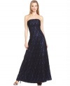 Calvin Klein's evening gown is classic and elegant with a strapless silhouette and a gorgeous lace overlay.