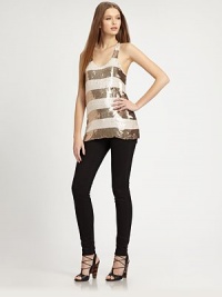 Dazzling sequined stripes over silk charmeuse, all in an easy racerback tank.Wide stripesScoopneckFlat frontRacerbackAbout 27 from shoulder to hemSilkLining; rayonDry cleanImportedModel shown is 5'10 (177cm) wearing US size Small. Dazzling sequined stripes over silk charmeuse, all in an easy racerback tank.Wide stripesScoopneckFlat frontRacerbackAbout 27 from shoulder to hemSilkLining; rayonDry cleanImportedModel shown is 5'10 (177cm) wearing US size Small.