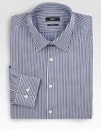 Bold stripes appoint a classic dress look in slim-fitting cotton. Buttonfront Moderate spread collar Cotton Dry clean Imported 