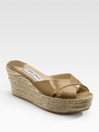 Simple slip-on design in shiny patent leather on textured rope wedge are must-haves this season. Wedge heel, 3 (75mm) Platform, 1½ (40mm) Compares to a 1½ heel (40mm) Open toe Crisscross strap Leather lining Rubber sole Made in ItalyOUR FIT MODEL RECOMMENDS ordering true whole size; ½ sizes should order the next whole size up. Simple slip-on design in shiny patent leather on textured rope wedge are must-haves this season. Wedge heel, 3 (75mm) Platform, 1½ (40mm) Compares to a 1½ heel (40mm) Open toe Crisscross strap Leather lining Rubber sole Made in ItalyOUR FIT MODEL RECOMMENDS ordering true whole size; ½ sizes should order the next whole size up.