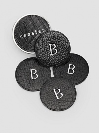 Water-treated coasters are crafted by hand in croco-embossed leather with non-skid bottoms to keep drinks in place and furniture safe. Set of four coasters arrive in a coordinating leather box for presentation and storage. Set of 4 4 diam. Made USA FOR PERSONALIZATION Select a quantity, then scroll down and click on PERSONALIZE & ADD TO BAG to choose and preview your personalization options. Please allow 1 week for delivery.