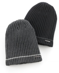Top off your look (and stay super warm) with the classic, reversible style of this ultra-soft ribbed acrylic beanie from Calvin Klein. Top off your look (and stay super warm) with the classic, reversible style of this ultra-soft ribbed acrylic beanie from Calvin Klein.