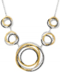 A shapely mix of sparkle and shine. Genevieve & Grace's chic circular necklace combines sterling silver and 18k gold over sterling silver with glittering marcasite accents. Approximate length: 17 inches. Approximate drop: 3/4 inch. A shapely mix of sparkle and shine. Genevieve & Grace's chic circular necklace combines sterling silver and 18k gold over sterling silver with glittering marcasite accents. Approximate length: 17 inches. Approximate drop: 3/4 inch.