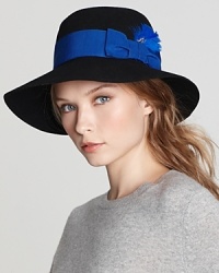 Dive head-first into a new season in Aqua's wool fedora, adorned with a ribbon bow and faux feather detail. Dive head-first into a new season in Aqua's wool fedora, adorned with a ribbon bow and faux feather detail.