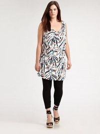 A festive print meets a design offering classic, draped details. This will be a figure-flattering tunic that you will love to wear with skinny jeans or leggings. Draped necklineSleevelessAllover printSelf-tie detail at backPull-on style About 37 from shoulder to hem94% venezia/6% spandexDry cleanMade in USA A festive print meets a design offering classic, draped details. This will be a figure-flattering tunic that you will love to wear with skinny jeans or leggings. Draped necklineSleevelessAllover printSelf-tie detail at backPull-on style About 37 from shoulder to hem94% venezia/6% spandexDry cleanMade in USA