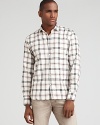 Spurr's flannel shirt is rendered in soft cotton, with an allover plaid pattern and slim fit.