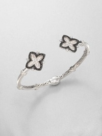 From the Soho Collection. This narrow design features white sapphire and black spinel accented clover-shaped end caps. White sapphiresBlack spinelSterling silverLength, about 7.5Slip-on styleImported From the Soho Collection. This narrow design features white sapphire and black spinel accented clover-shaped end caps. White sapphiresBlack spinelSterling silverLength, about 7.5Slip-on styleImported