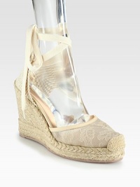 Semi-sheer floral lace and wrap-around ties add feminine style to this woven design, lifted by a textured espadrille wedge. Covered wedge, 4 (100mm)Covered platform, 1 (25mm)Compares to a 3 heel (75mm)Lace and woven fabric upper with leather trimLeather liningRubber trek solePadded insoleMade in Italy Semi-sheer floral lace and wrap-around ties add feminine style to this woven design, lifted by a textured espadrille wedge. Covered wedge, 4 (100mm)Covered platform, 1 (25mm)Compares to a 3 heel (75mm)Lace and woven fabric upper with leather trimLeather liningRubber trek solePadded insoleMade in Italy