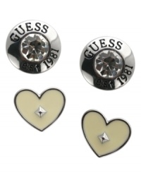 Show your love for GUESS! This cute set-of-2 stud earrings create instant style with ivory epoxy hearts with stud detail and silver tone buttons with glass stone and logo accents. Set in imitation rhodium-plated mixed metal. Approximate diameter (button): 5/8 inch. Approximate diameter (heart): 1/2 inch. Show your love for GUESS! This cute set-of-2 stud earrings create instant style with ivory epoxy hearts with stud detail and silver tone buttons with glass stone and logo accents. Set in imitation rhodium-plated mixed metal. Approximate diameter (button): 5/8 inch. Approximate diameter (heart): 1/2 inch.
