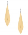 Smooth, sleek, and totally stylish! Kenneth Cole New York's polished drop earrings feature an elongated diamond shape in gold tone mixed metal. Approximate drop: 2 inches.