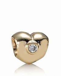 PANDORA's classic 14K gold heart charm is enhanced with a sparkling white diamond center. PANDORA's classic 14K gold heart charm is enhanced with a sparkling white diamond center.
