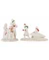 Mistletoe Park villagers revel in the spirit of the holidays, building snowmen and pulling home trees in two beautiful porcelain figurines accented with gold and Christmas-color detail. From Lenox.