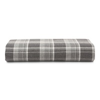 Inspired by the refined polish of menswear, this relaxed collection pairs solid brushed cotton and twill with faux suede trim and plaid. Sheets and pillowcases are in a soft cotton bold plaid in a grey and white palette.