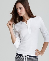 A classic long sleeve henley in a tailored silhouette, monogrammed RLL pocket and rounded hem. A classic long sleeve henley in a tailored silhouette, monogrammed RLL pocket and rounded hem.