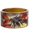Infuse your look with the bold colors and exotic prints of Brasil. Crafted in gold tone mixed metal Haskell's Palm bangle features brown, red and green palm leaf details and a hinge clasp. Approximate diameter: 2-1/2 inches. Approximate length: 8 inches. Item comes packaged in an orange gift box.