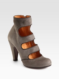 Strut in this suede ankle boot with unexpected cutouts, simple grosgrain ribbon trim and a powerful heel. Self-covered heel, 4 (100mm)Suede upper with grosgrain ribbon trimSide zipLeather liningLeather and rubber solePadded insoleImported Strut in this suede ankle boot with unexpected cutouts, simple grosgrain ribbon trim and a powerful heel. Self-covered heel, 4 (100mm)Suede upper with grosgrain ribbon trimSide zipLeather liningLeather and rubber solePadded insoleImported