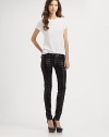 Textured, high-shine finish gives these leggings-style skinnies a leather-like look. THE FITRise, about 7Inseam, about 31Leg opening, about 10½THE DETAILSButton closureZip flyFive-pocket styleSupima cotton/cotton/modal/polyurethaneMachine washMade in USA of imported fabricModel shown is 5'11 (178cm) wearing US size 4.