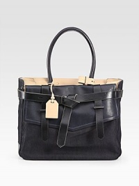 A versatile silhouette of chic denim against vachetta facing, finished with a tailored flap front and buckled belt.Double top handles, 8 dropOne outside flap pocketOne outside open pocketProtective metal feetCenter zip compartmentOne inside zip pocketOne inside open pocketCotton lining10¾W X 14½H X 4½DImported A versatile silhouette of chic denim against vachetta facing, finished with a tailored flap front and buckled belt.Double top handles, 8 dropOne outside flap pocketOne outside open pocketProtective metal feetCenter zip compartmentOne inside zip pocketOne inside open pocketCotton lining10¾W X 14½H X 4½DImported