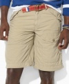 A button-flap cargo pocket at the leg lends rugged appeal to a preppy short in comfortable cotton poplin.