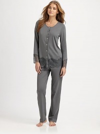 A wide band of exquisite lace drapes from the lower edges of this soft, long-sleeve top. JewelneckButton front closureLong sleeves with lace trimAbout 26¾ from shoulder to hem45% modal/45% cotton/8% nylon/2% elastaneHand washMade in Italy A wide band of exquisite lace drapes from the lower edges of this soft, long-sleeve top. JewelneckButton front closureLong sleeves with lace trimAbout 26¾ from shoulder to hem45% modal/45% cotton/8% nylon/2% elastaneHand washMade in Italy