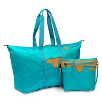 Hartmann's Packcloth Collection offers the ultimate in practical convenience-with classic, sophisticated style. Made of extremely durable 400-denier nylon with antique brassware and Hartmann's signature trim, each piece comes with a lifetime warranty, as well as all of the technical elements serious travelers require. The Combo Duffel and Crossbody Bag make the perfect travel companions. Hartmann's Packcloth Collection offers the ultimate in practical convenience-with classic, sophisticated style. Made of extremely durable 400-denier nylon with antique brassware and Hartmann's signature trim, each piece comes with a lifetime warranty, as well as all of the technical elements serious travelers require. The Combo Duffel and Crossbody Bag make the perfect travel companions.