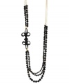 Have knots. This multi-row necklace from Haskell is crafted from gold-tone mixed metal with black faceted beads, as well as gold-tone and glass crystal accents for a lustrous touch. Approximate length: 35 inches + 3-inch extender. Approximate drop: 2 inches.